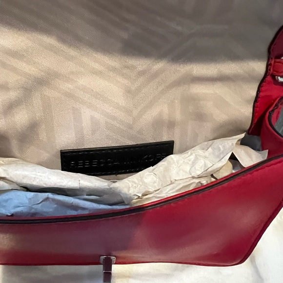 Selling a brand new Rebeca Minkoff crossbody bag in red. - Picture 4 of 7